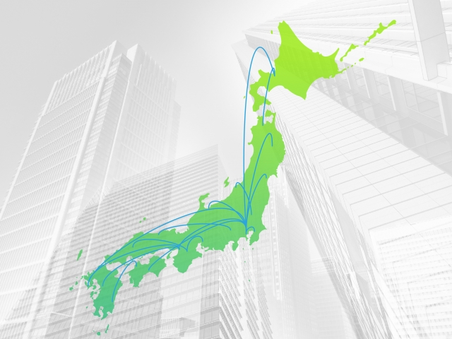 日本地図と高層ビル
